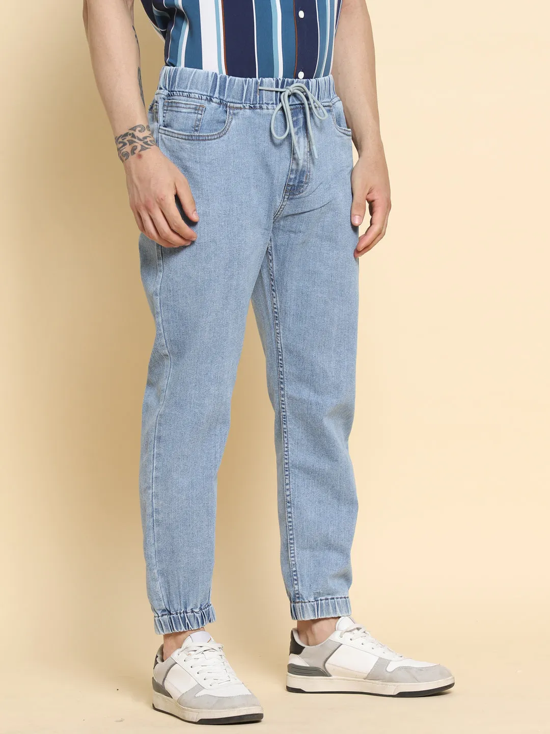 Men's Slim Fit Medium Blue Denim Jeans Waistband With Belt Loops Has A Button Rivet And Zip Closure