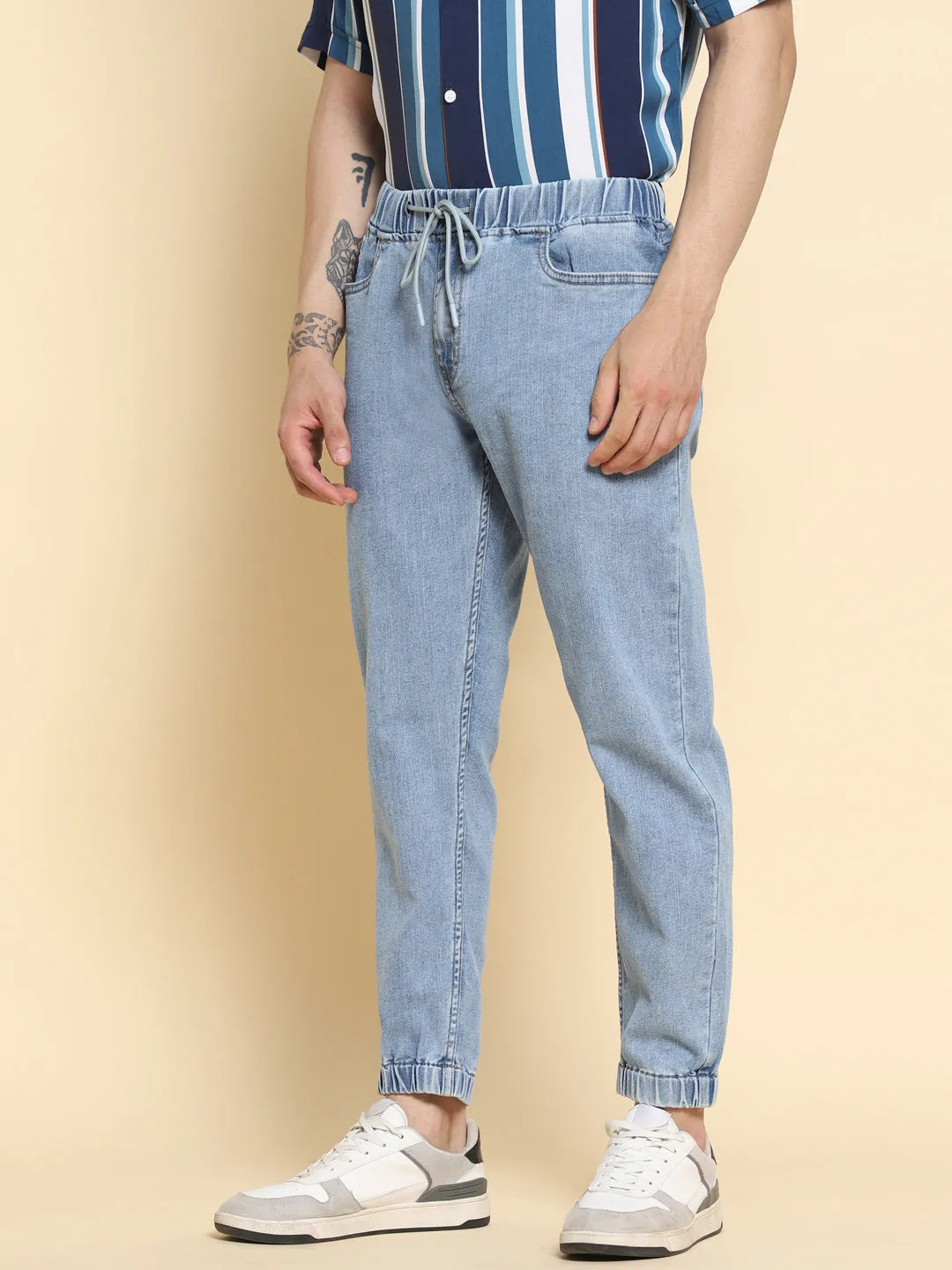 Men's Slim Fit Medium Blue Denim Jeans Waistband With Belt Loops Has A Button Rivet And Zip Closure